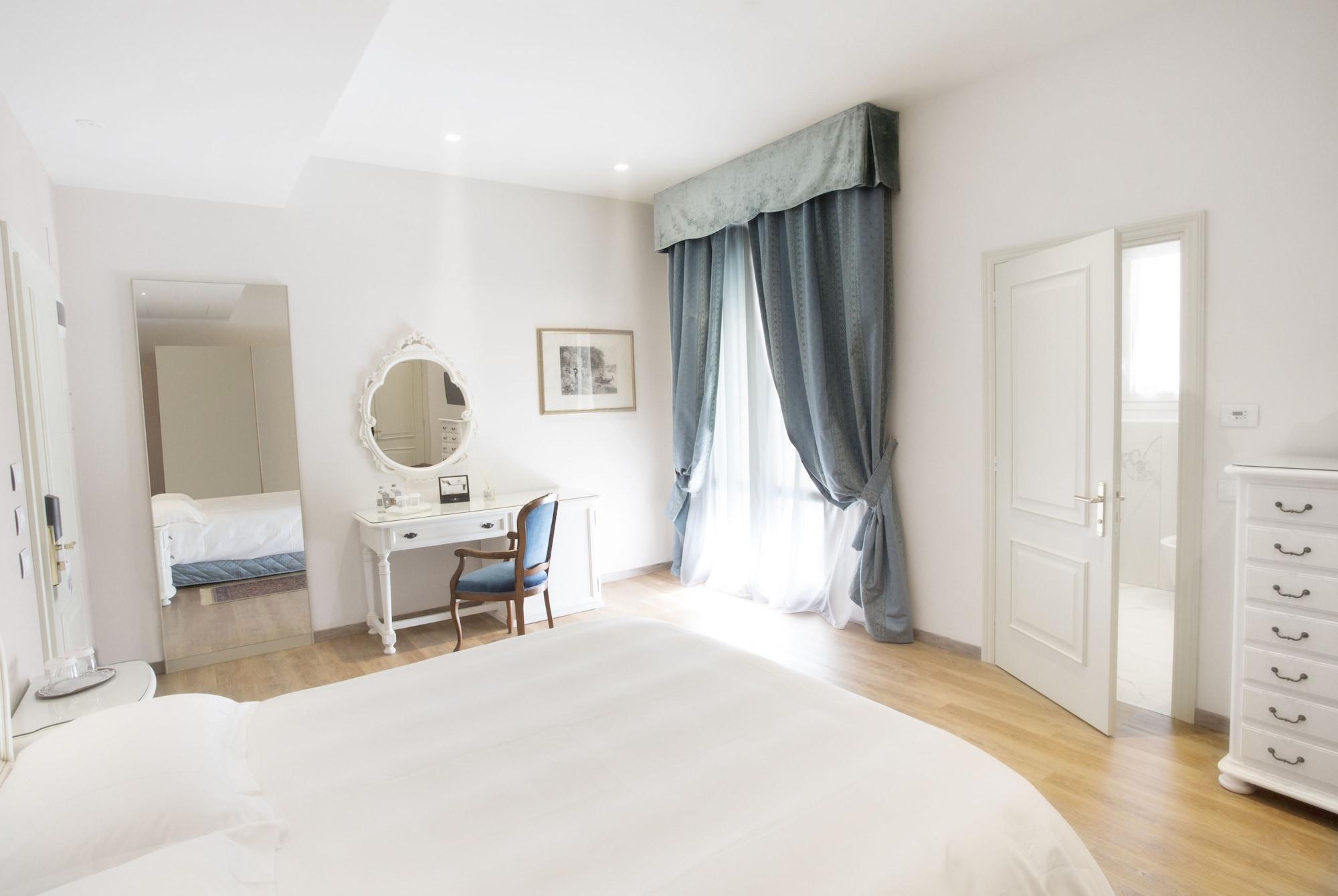 Grand Hotel Trieste & Victoria Abano Terme Eksteriør billede A bedroom